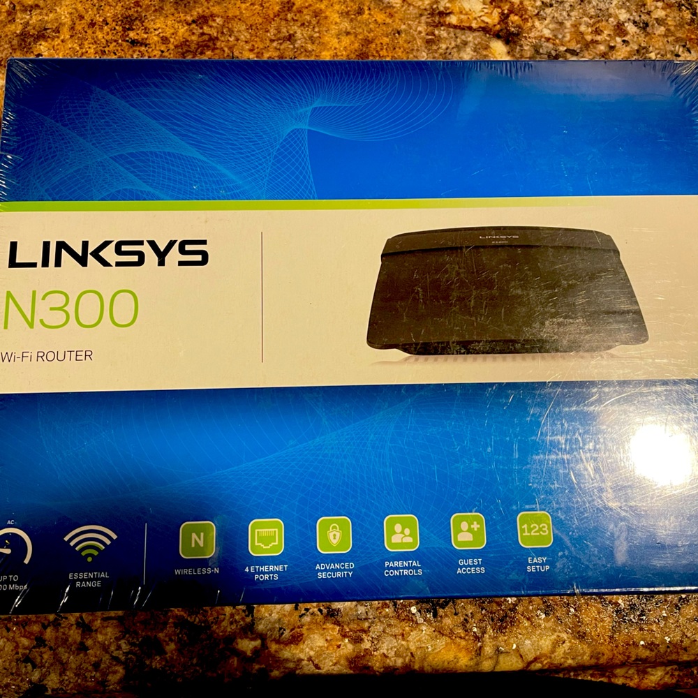 LINKSYS N300 E1200 Wi-Fi Router New in plastic unopened.